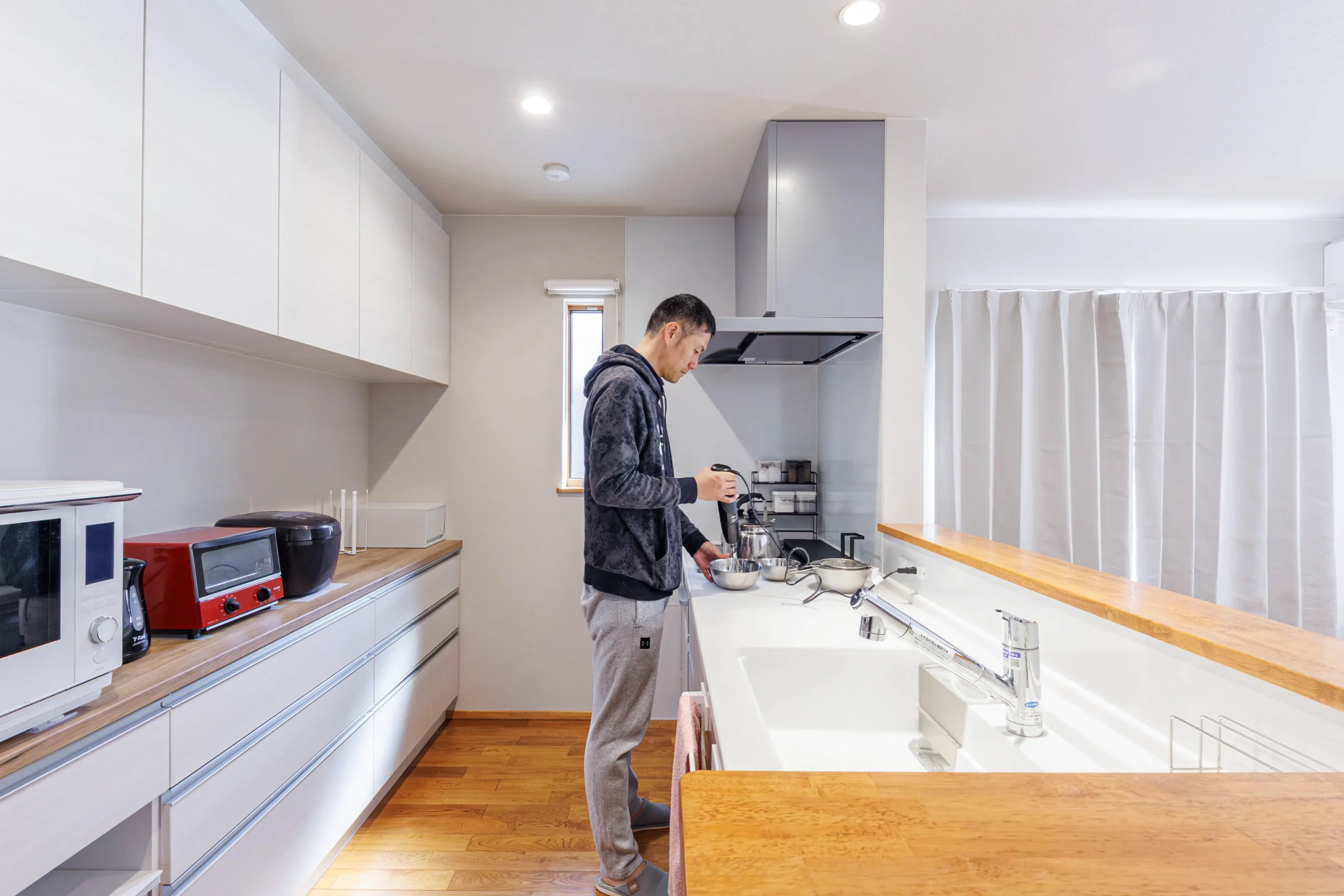 対面キッチンで料理を楽しむ暮らし。家族との時間を大切にできる注文住宅のキッチン